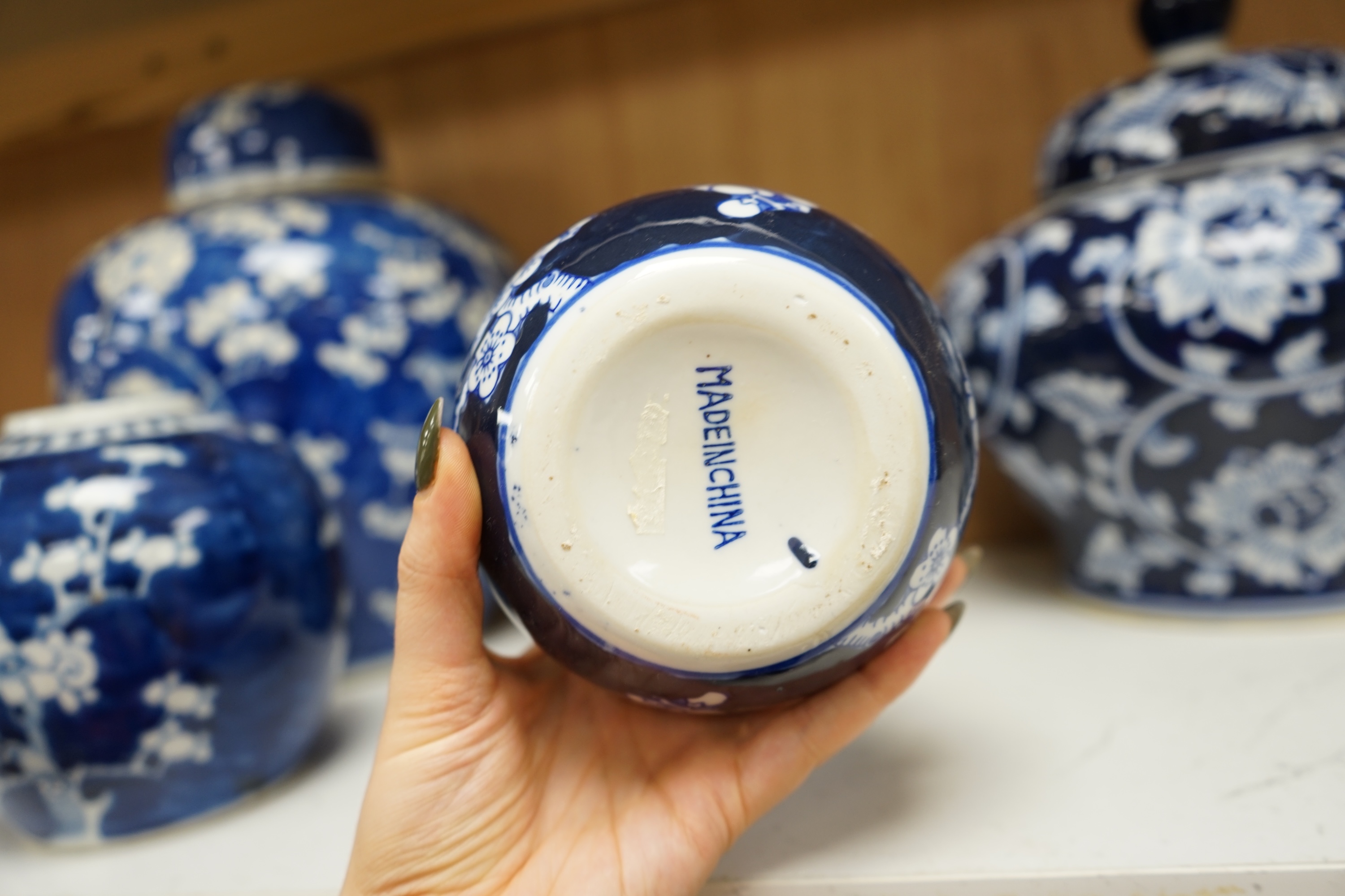 Six various Chinese prunus pattern blue and white jars, tallest 26cm. Condition - varies